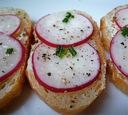 A simple appetizer of sliced radishes on bread with butter and sea salt is classic and delicious